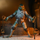 NECAOnline.com | Universal Monsters/Teenage Mutant Ninja Turtles - 7" Scale Action Figure - Ultimate Michelangelo as The Mummy