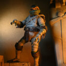 NECAOnline.com | Universal Monsters/Teenage Mutant Ninja Turtles - 7" Scale Action Figure - Ultimate Michelangelo as The Mummy